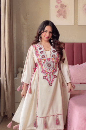 Women’s Cream Embroidered Long Kurti with Multicolor Circular Motifs and Tassel Accents – Heritage-Inspired Ethnicwear Portrait