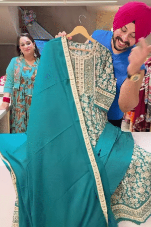 Women’s Teal Embroidered Long Kurti with Beige Floral & Paisley Motifs – Ethnicwear Portrait Piece for Seasonal Styling