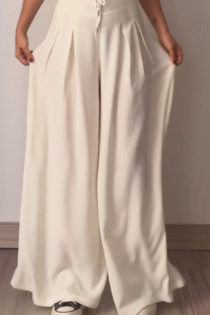 Women’s Beige Wide-Leg Pleated Pants with Drawstring Waist – Flowing Casualwear Styled with White Sneakers